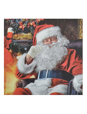 20 serviettes en papier Pere noel dans son fauteuil