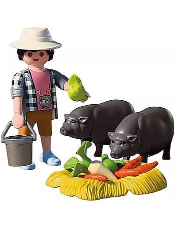 Agriculteur avec cochons