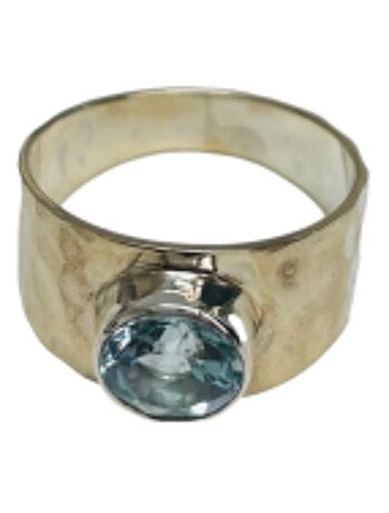 Bague jonc en argent et topaze bleue facettée