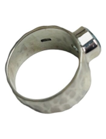 Bague jonc en argent et topaze bleue facettée