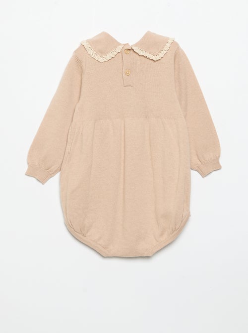 Barboteuse en tricot avec col et poches fantaisie - Kiabi Barboteuse en tricot avec col et poches fantaisie - Kiabi