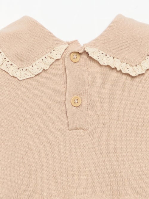 Barboteuse en tricot avec col et poches fantaisie - Kiabi Barboteuse en tricot avec col et poches fantaisie - Kiabi