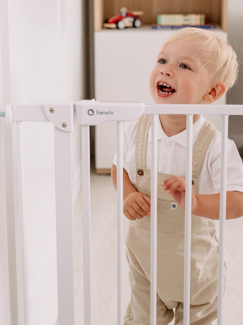 Barrière de sécurité bébé LIONELO Truus Slim - 75-105 cm - Fixation par pression - Sans perçage - Kiabi Barrière de sécurité bébé LIONELO Truus Slim - 75-105 cm - Fixation par pression - Sans perçage - Kiabi