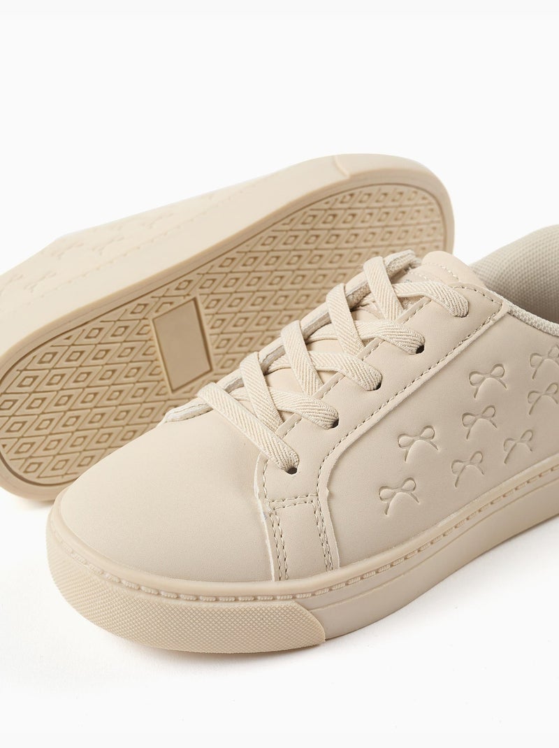 Baskets avec nœuds en relief et lacets élastiques Beige - Kiabi