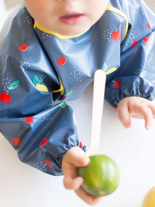 Bavoir plastifié manches longues Fruits