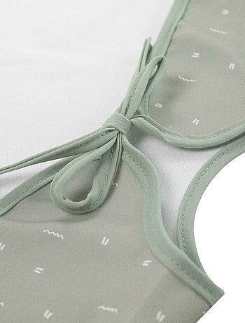 Bavoir tablier avec récupérateur pour bébé