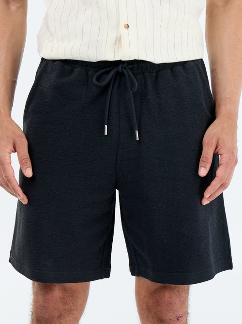 Bermuda à la taille élastiquée + cordons - Kiabi Bermuda à la taille élastiquée + cordons - Kiabi
