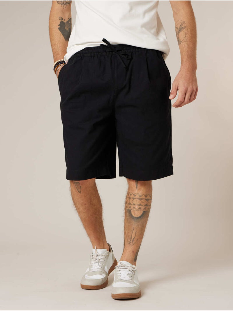Bermuda loose homme en 100% coton 'Deeluxe' Noir - Kiabi