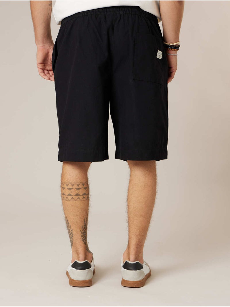 Bermuda loose homme en 100% coton 'Deeluxe' Noir - Kiabi