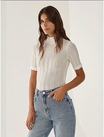 Blouse à col montant court en maille torsadée
