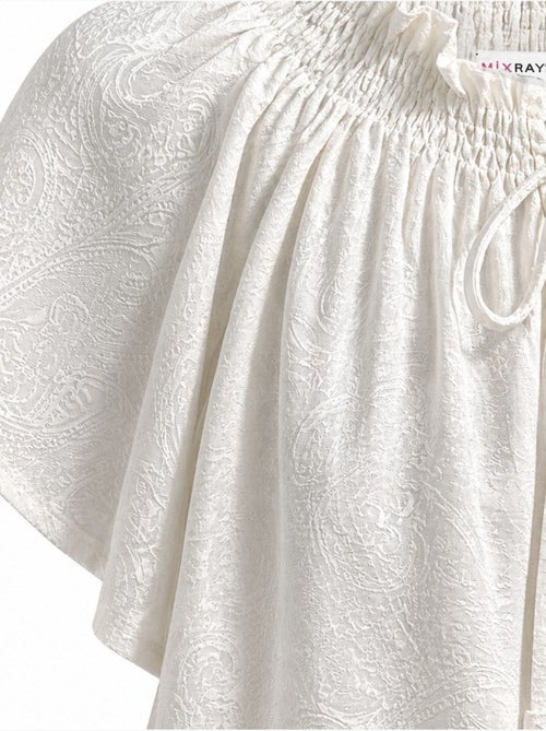 Blouse à col rond à imprimé paisley avec détail nouée mixray - Kiabi Blouse à col rond à imprimé paisley avec détail nouée mixray - Kiabi