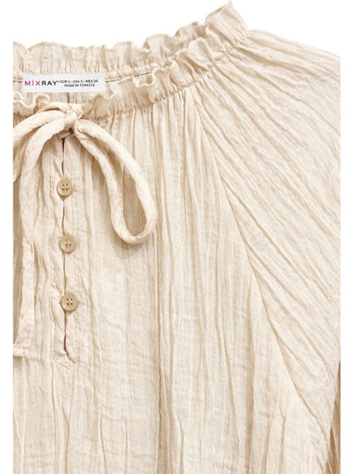 Blouse à col rond avec détail de nœud mixray - Kiabi Blouse à col rond avec détail de nœud mixray - Kiabi