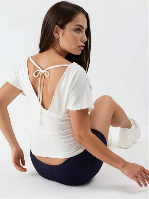 Blouse à col v avec détail nœud busem - Kiabi