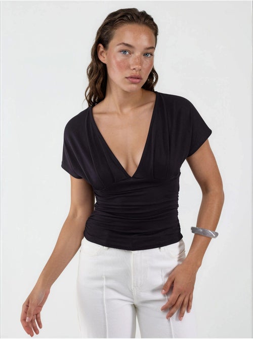 Blouse à col v avec détail nœud busem - Kiabi Blouse à col v avec détail nœud busem - Kiabi