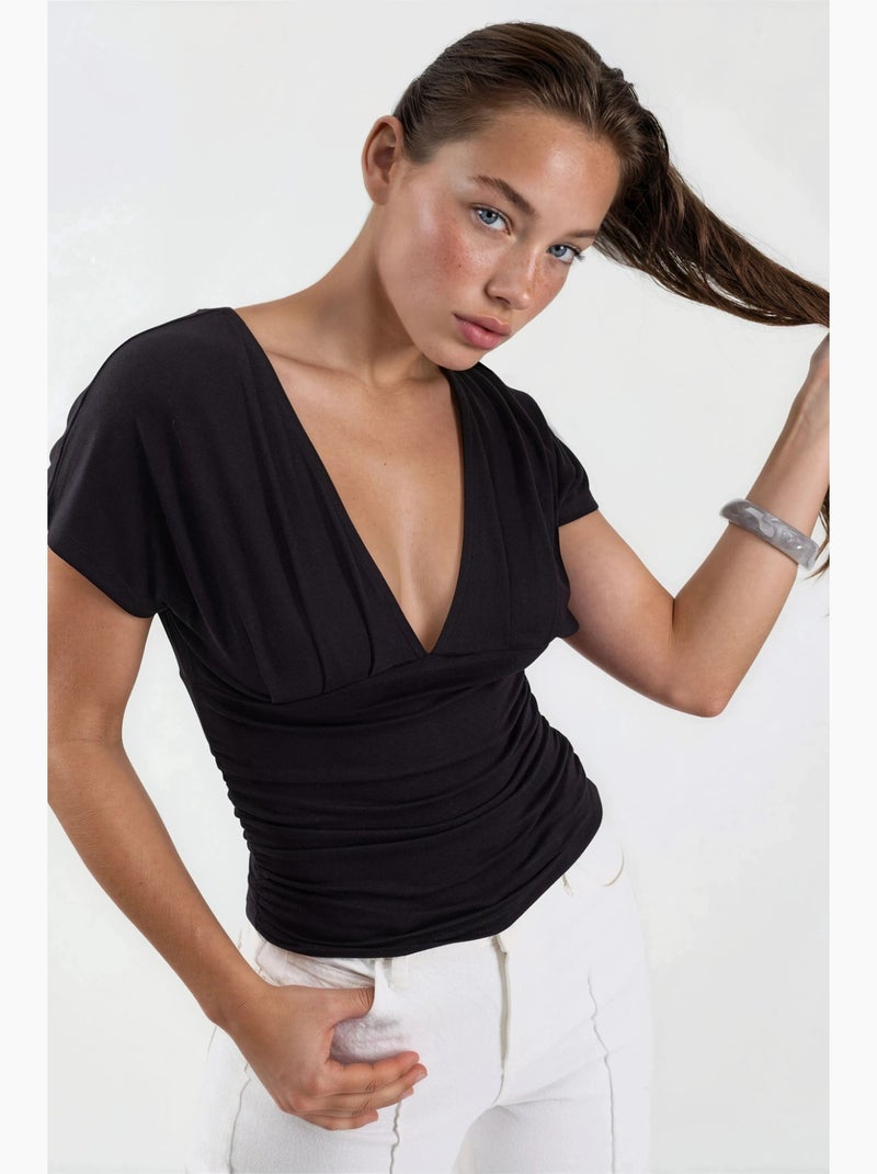 Blouse à col v avec détail nœud busem Noir - Kiabi