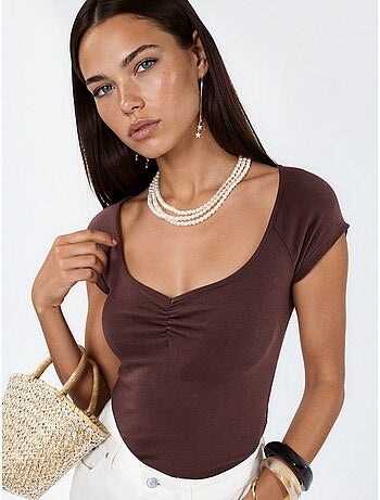Blouse à col v et manches courtes avec drapé busem