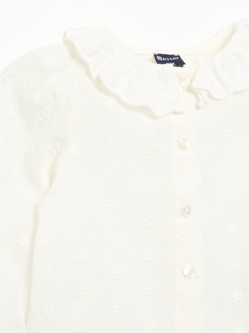 Blouse à manches longues en voile de coton avec fleurs brodées - Kiabi Blouse à manches longues en voile de coton avec fleurs brodées - Kiabi