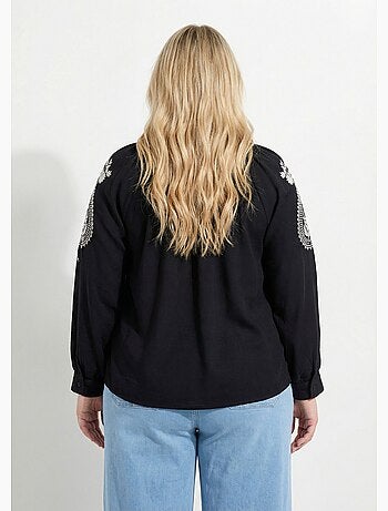 Blouse avec broderies et petit col V