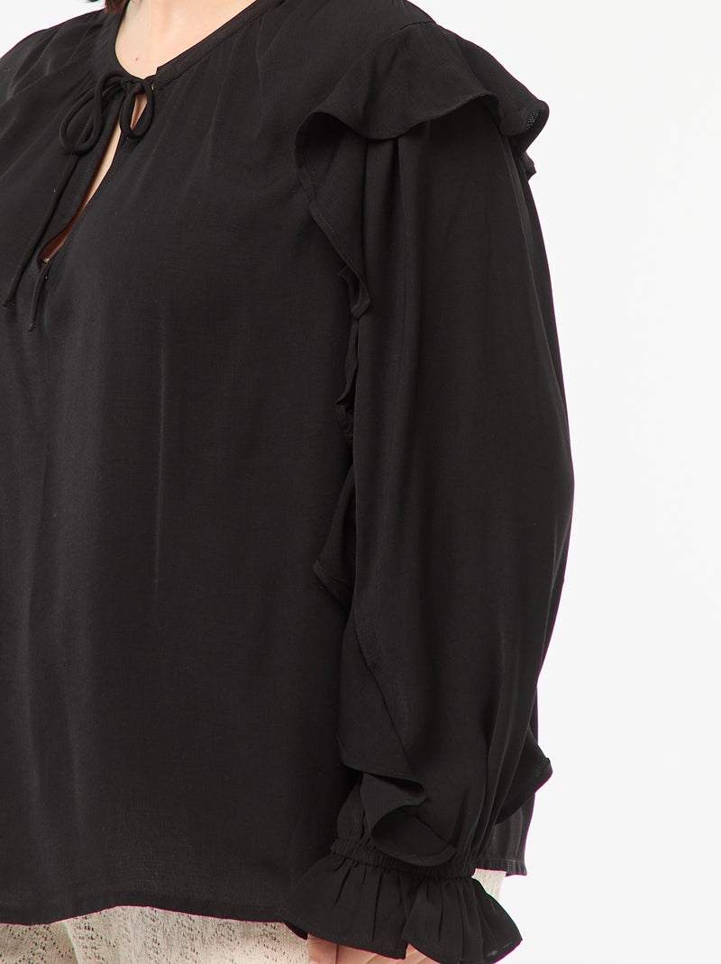 Blouse avec épaules et poignets volantés + liens à nouer au col Noir - Kiabi