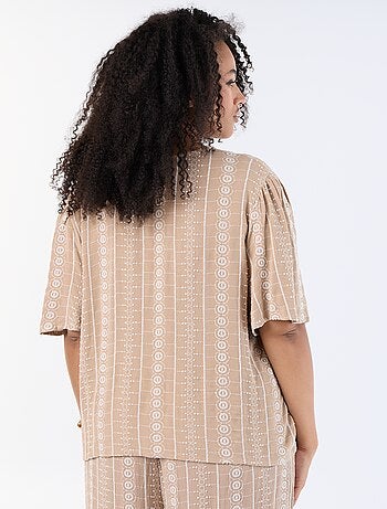 Blouse avec nœuds et broderies à manches courtes