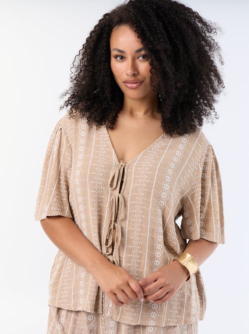 Blouse avec nœuds et broderies à manches courtes - Kiabi