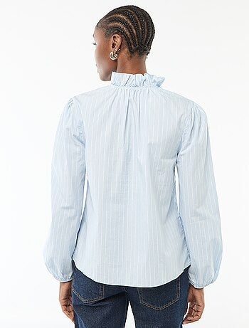 Blouse avec volants au col et à l'ouverture