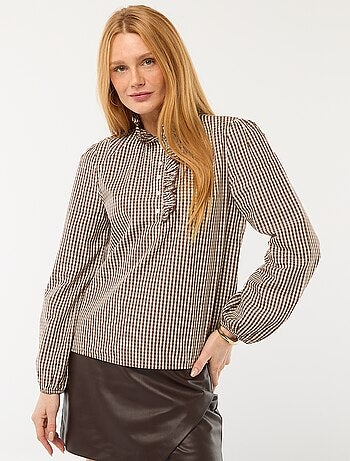 Blouse avec volants au col et à l'ouverture