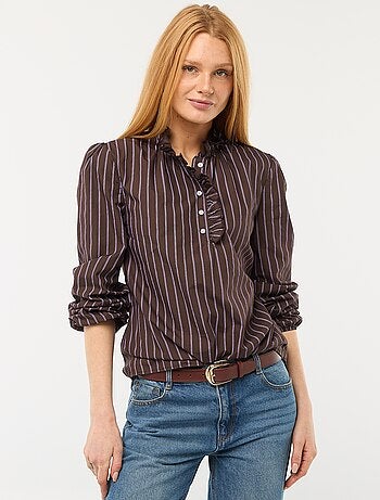 Blouse avec volants au col et à l'ouverture