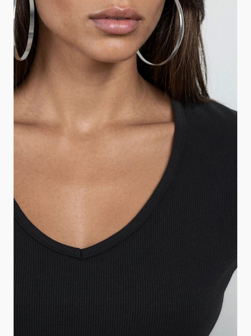Blouse côtelée à col v busem - Kiabi Blouse côtelée à col v busem - Kiabi