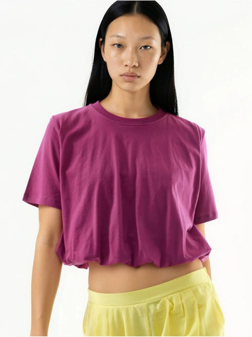 Blouse courte à col rond avec élastique busem - Kiabi Blouse courte à col rond avec élastique busem - Kiabi