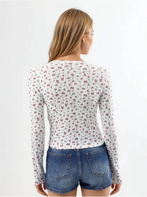 Blouse courte côtelée à fleurs avec fermeture boutonnée busem - Kiabi Blouse courte côtelée à fleurs avec fermeture boutonnée busem - Kiabi