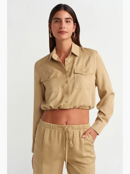 Blouse courte en tencel façon chemise dilvin - Kiabi Blouse courte en tencel façon chemise dilvin - Kiabi
