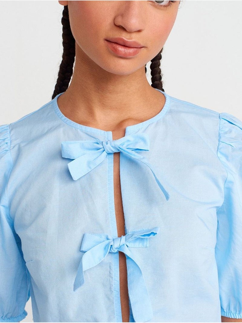 Blouse courte femme avec détail nœud dilvin Bleu ciel - Kiabi