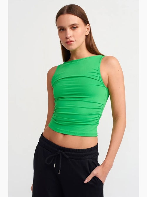 Blouse crop sans manches à encolure bateau dilvin - Kiabi Blouse crop sans manches à encolure bateau dilvin - Kiabi