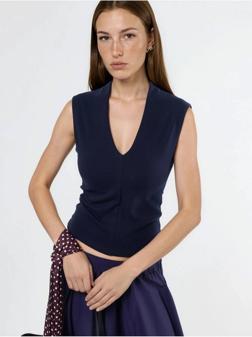 Blouse drapée sans manches avec col en v busem - Kiabi Blouse drapée sans manches avec col en v busem - Kiabi