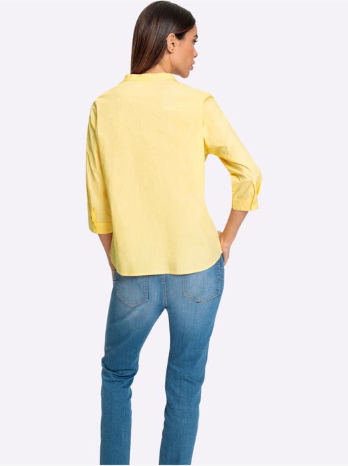 Blouse en coton col V manches trois quarts et ourlet arrondi - Taille standard - Helline - Kiabi Blouse en coton col V manches trois quarts et ourlet arrondi - Taille standard - Helline - Kiabi