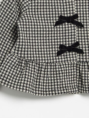 Blouse en flanelle avec nœuds et base volantée