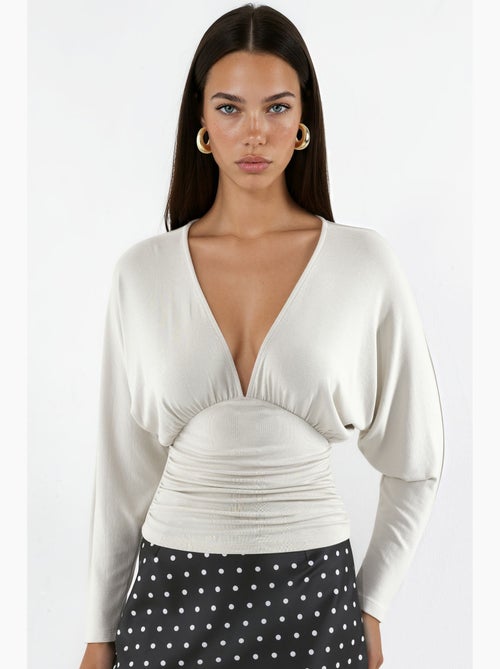 Blouse en maille à col v coupe décontractée hiccup - Kiabi Blouse en maille à col v coupe décontractée hiccup - Kiabi