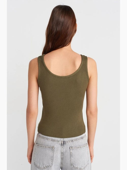 Blouse en maille côtelée sans manches dilvin - Kiabi Blouse en maille côtelée sans manches dilvin - Kiabi