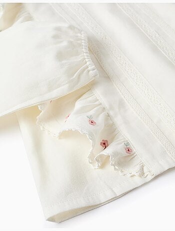 Blouse en sergé avec volants et fleurs