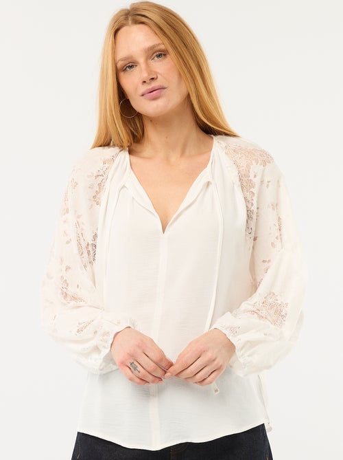 Blouse fluide avec manches en dentelle transparente - Kiabi