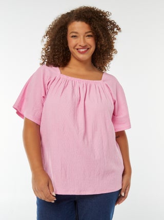 Blouse fluide encolure bardot en maille gaufrée