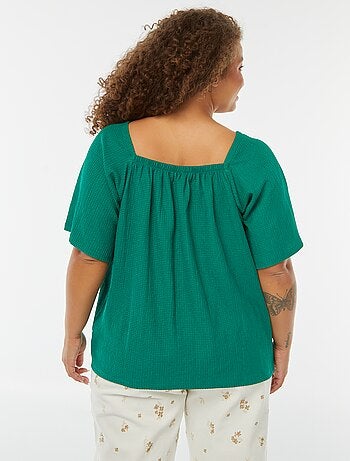 Blouse fluide encolure bardot en maille gaufrée
