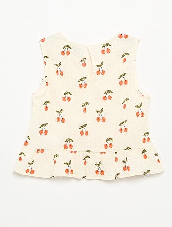Blouse gaufrée sans manches