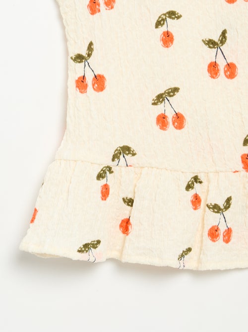 Blouse gaufrée sans manches - Kiabi