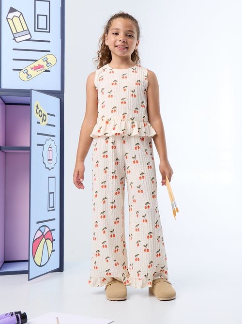 Blouse gaufrée sans manches - Kiabi Blouse gaufrée sans manches - Kiabi