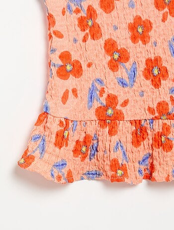 Blouse gaufrée sans manches