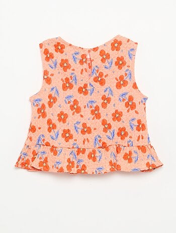 Blouse gaufrée sans manches