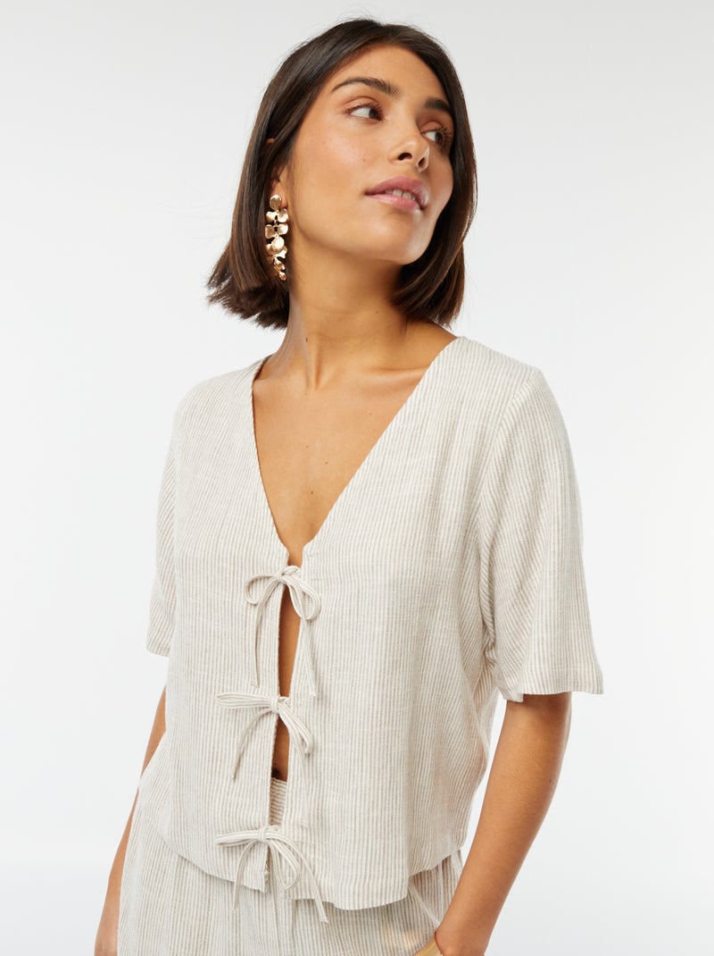 Blouse gilet avec nœuds Beige - Kiabi
