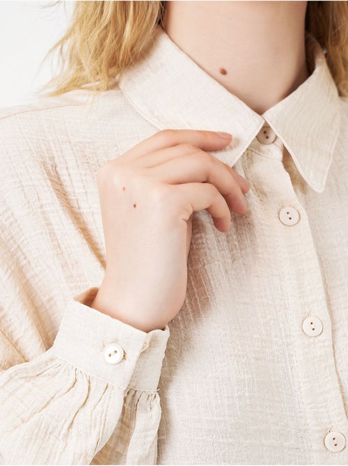 Blouse longue oversize texturée avec col chemise bdart - Kiabi Blouse longue oversize texturée avec col chemise bdart - Kiabi